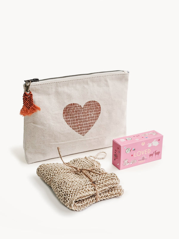 Eco-friendly gift set including a handmade heart cotton pouch, handcrafted soap bar and an exfoliating hemp fiber washcloth