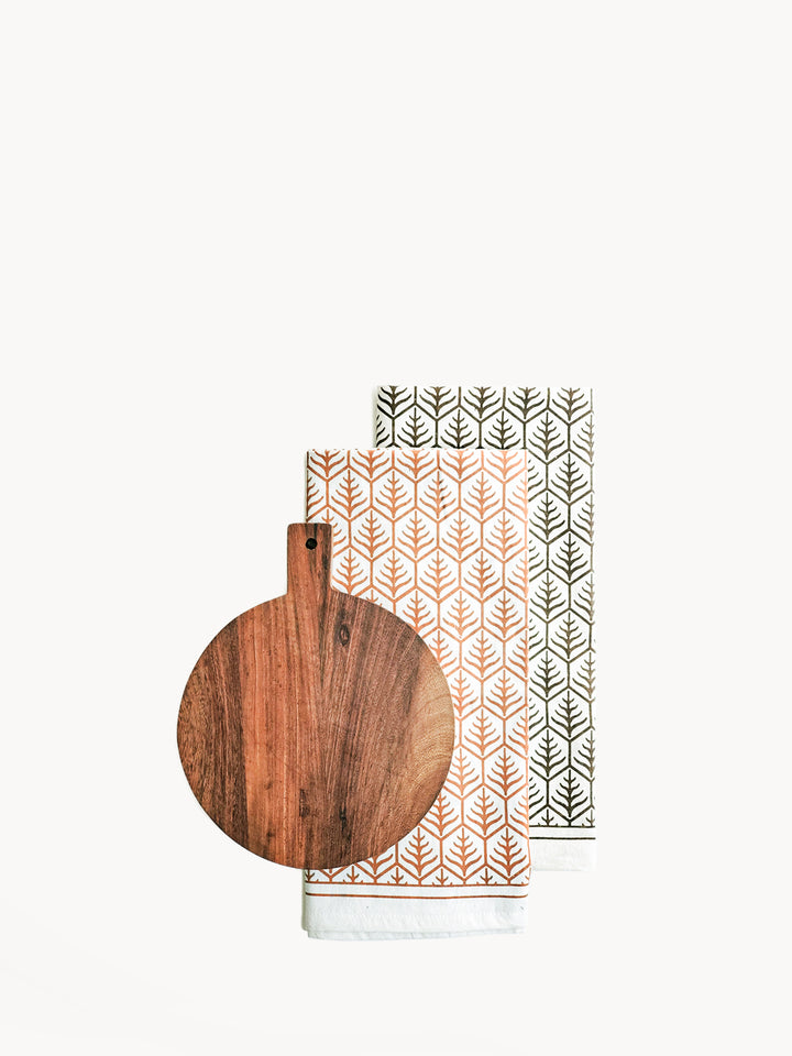 handcrafted wooden round serving board gift set from sturdy Albizia hardwood and hand screen-printed tea towels in two colors on natural cotton