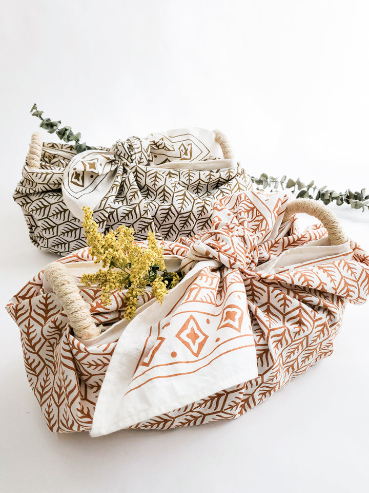 Bread warmers and baskets wrapped by a traditional Korean wrapping cloth called Bojagi.