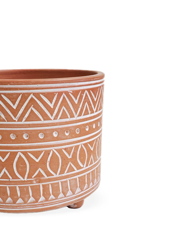 Handmade terracotta pot - small is artisan-inspired patterns that have been hand etched. A beautiful design of dynamic geometric patterns and hand-crafted from clay.