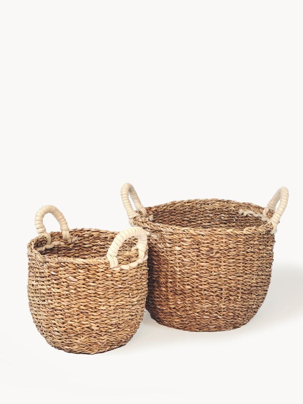 These beautiful seagrass baskets are the perfect solution to tidy up any space. Use them for storing toys, books, and plants.